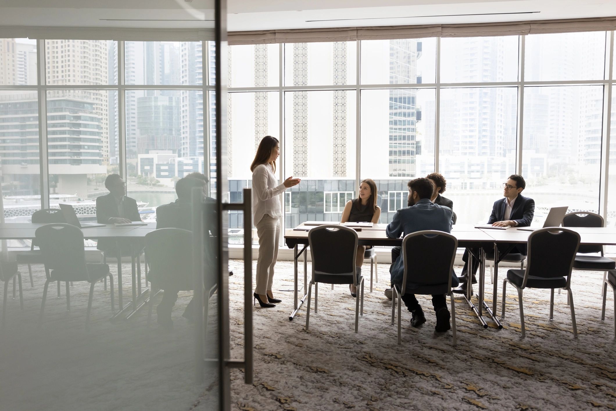 Business leaders in a strategic executive coaching meeting
