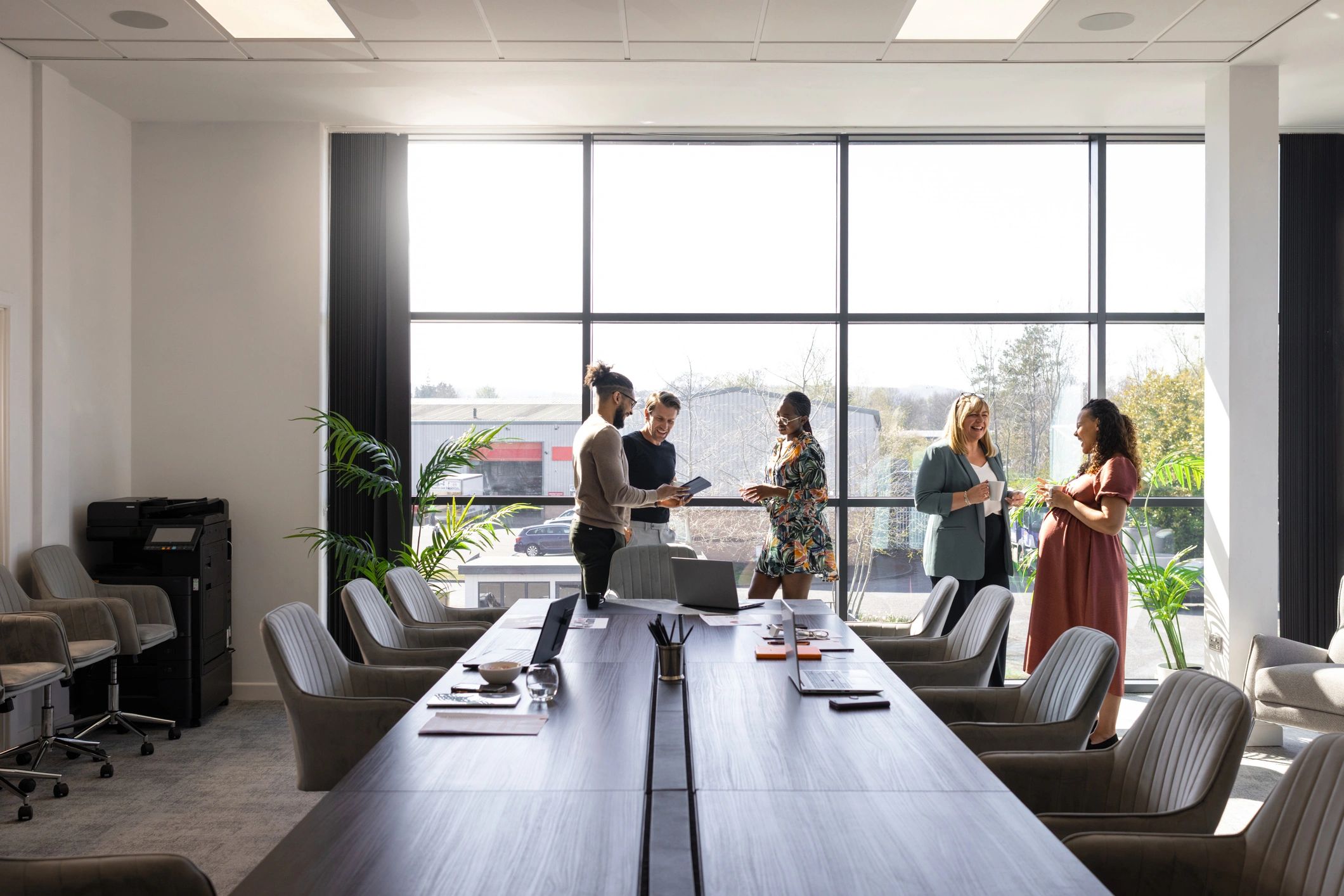Business leaders in conversation during a collaborative meeting